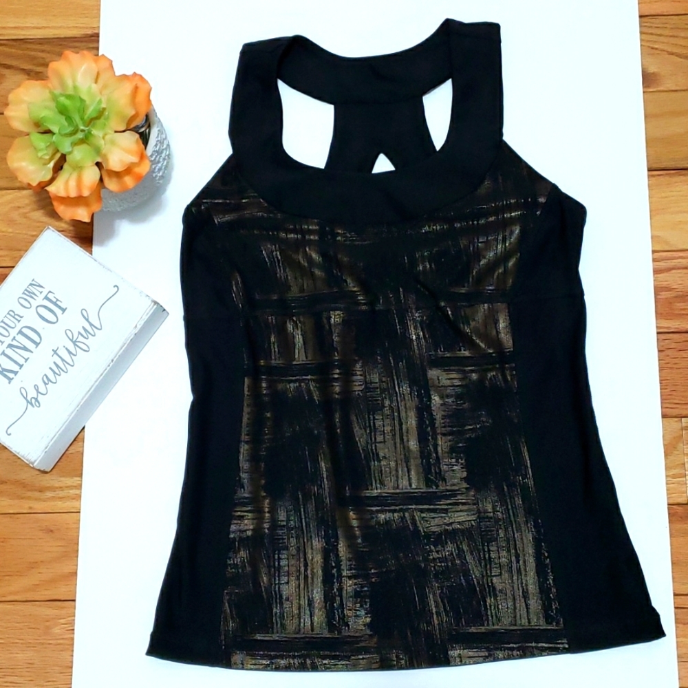 Xersion metallic gold and black active top